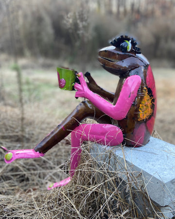 repurposed metal art frog with cup