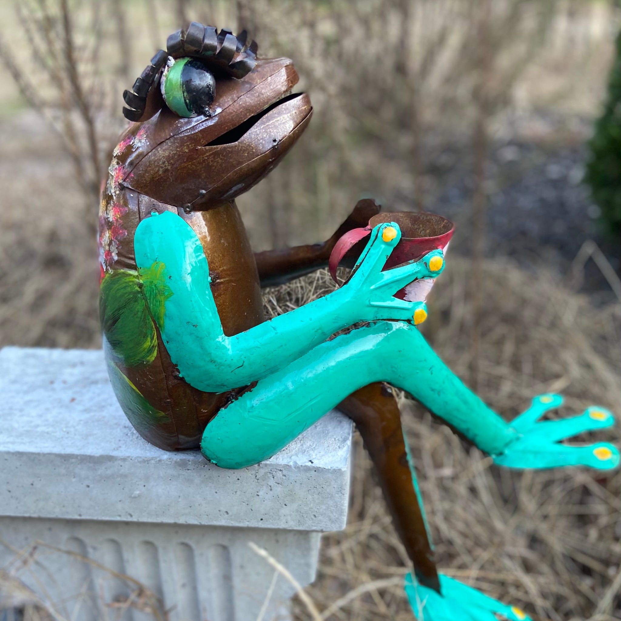 repurposed metal art frog with cup