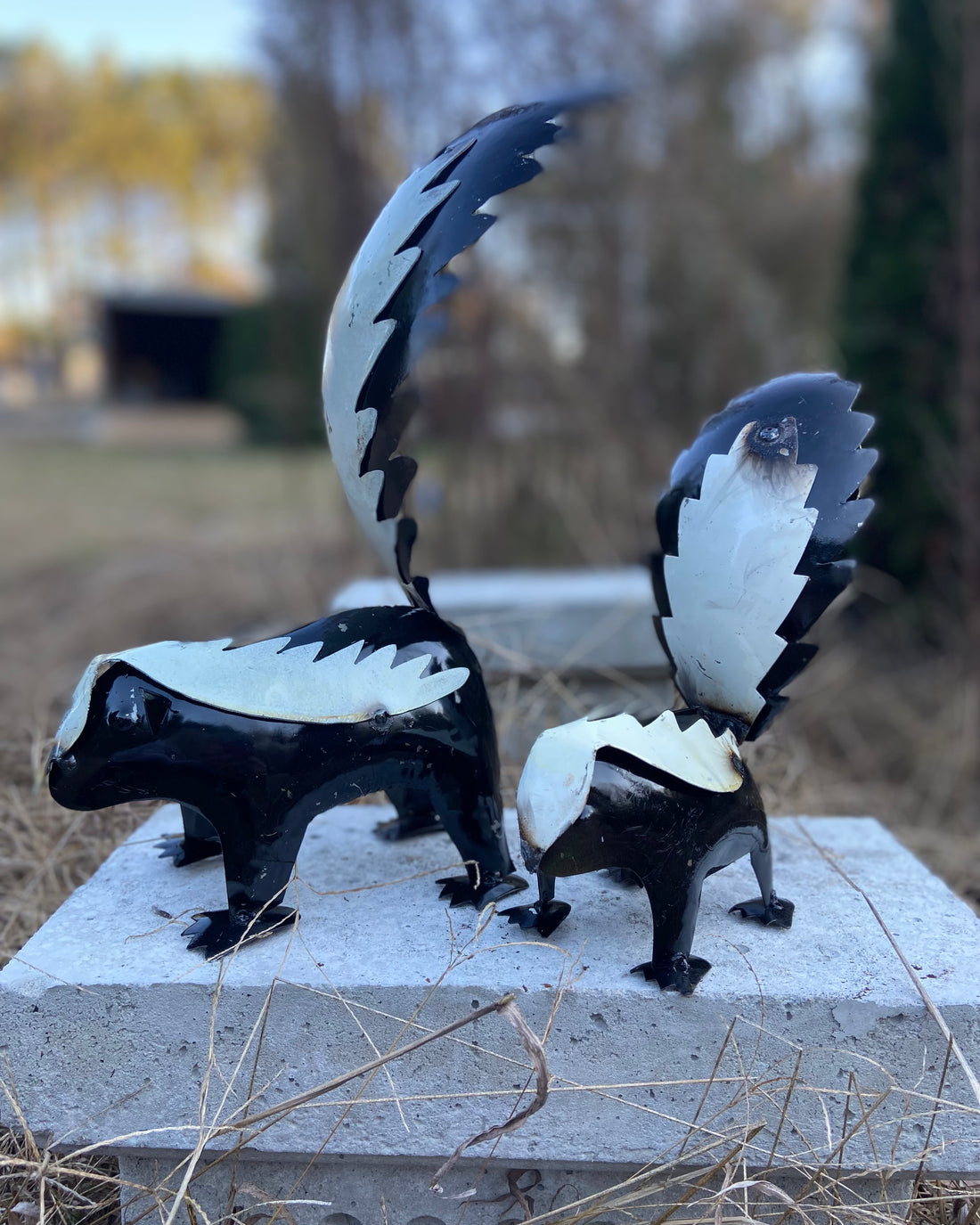 repurposed metal art skunk small
