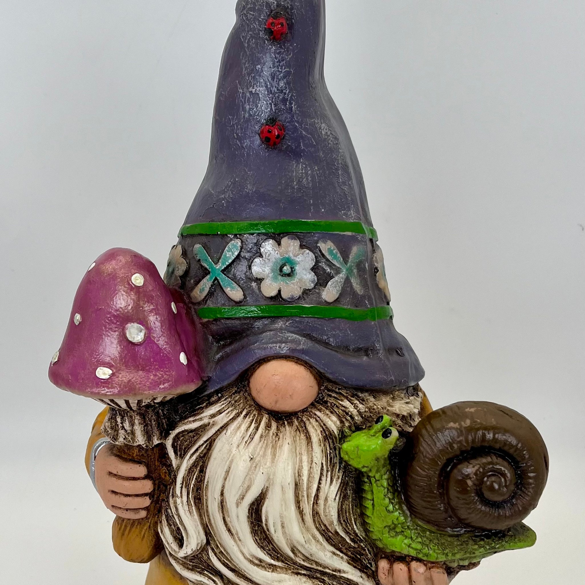 imports gnome purple hat/yellow jacket
